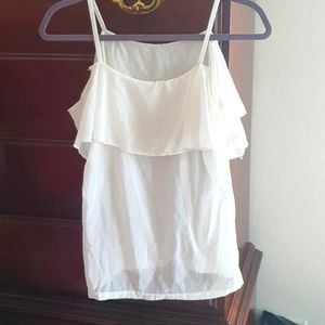 A white flowy camisole.